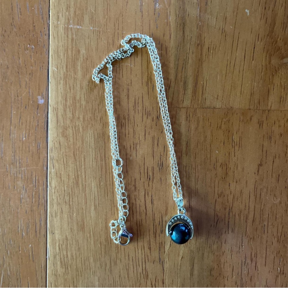 Elegant Silver Necklace with Black Pendant